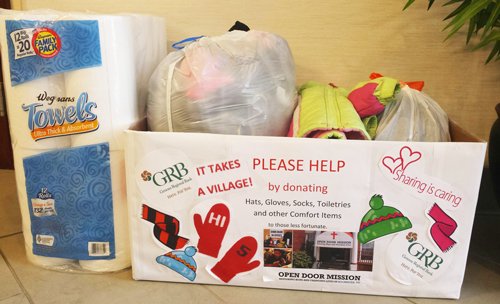 Collection box with donations for the Open Door Mission